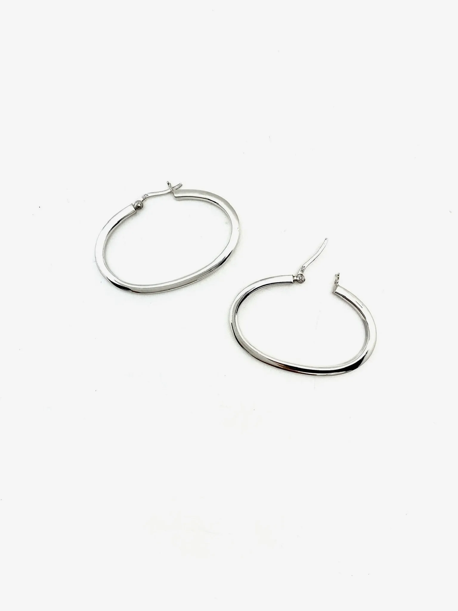 Oblong Silver Oval Hoops