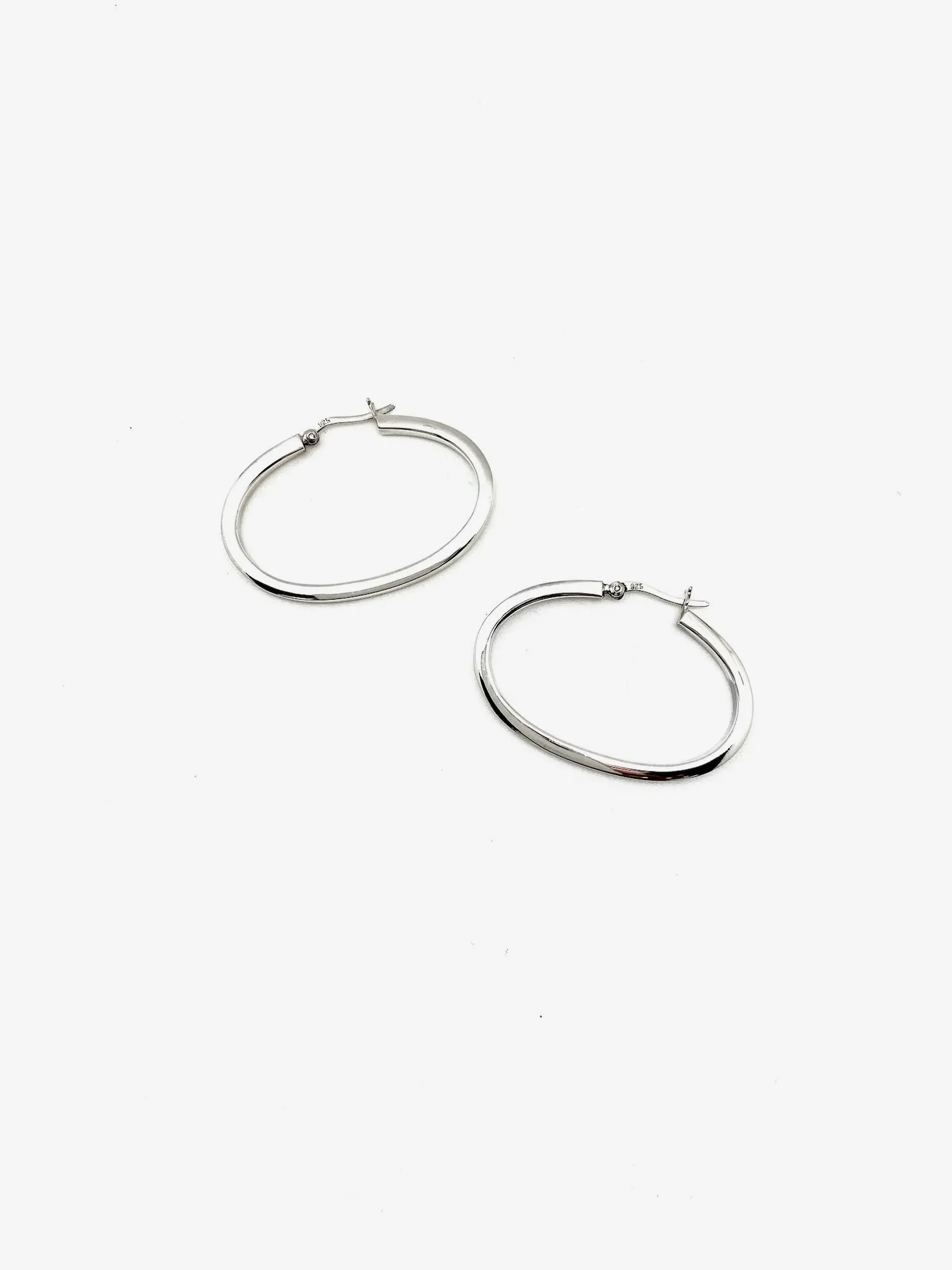 Oblong Silver Oval Hoops